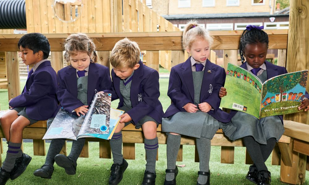 Co-ed students at Bickley Park School reading academic books.