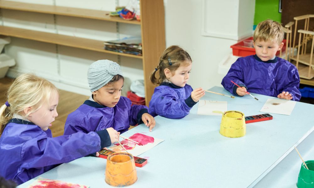 Nursery co-ed students at Bickley Park School in art class.